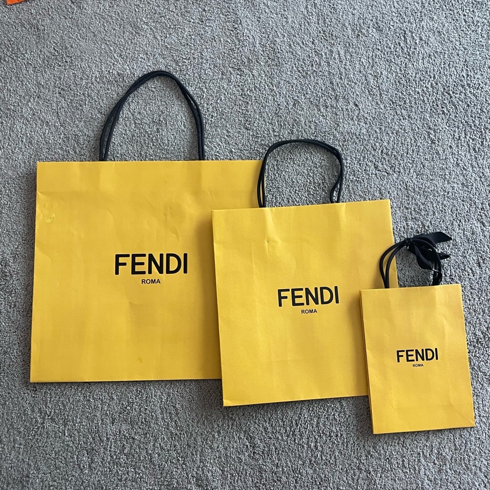 Three Fendi shopping bags